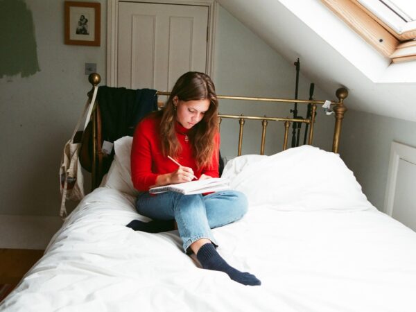 Ella Hohnen-Ford on a bed